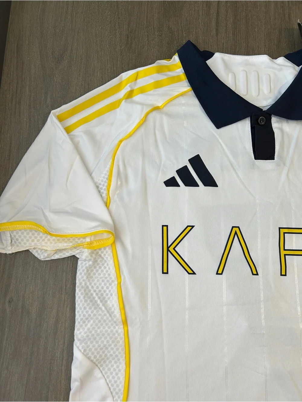 Al- Nassr adidas White, Yellow & Navy KAFD Men's Soccer Polo Jersey